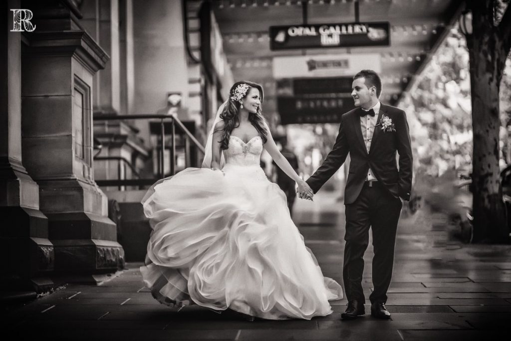 wedding photography package Melbourne black and white photo of married couple in the airport