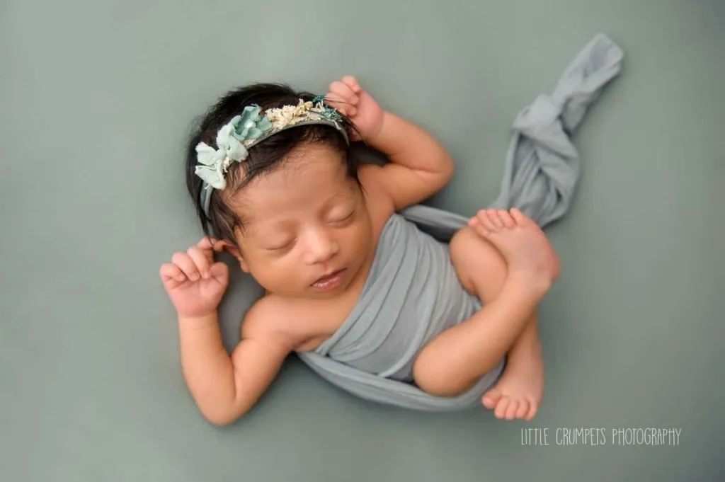 newborn photoshoot London baby with a blue headband