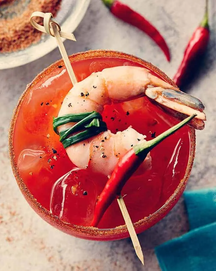 A Bloody Mary garnished with shrimp and peppers captures the attention of food photographers in Toronto.